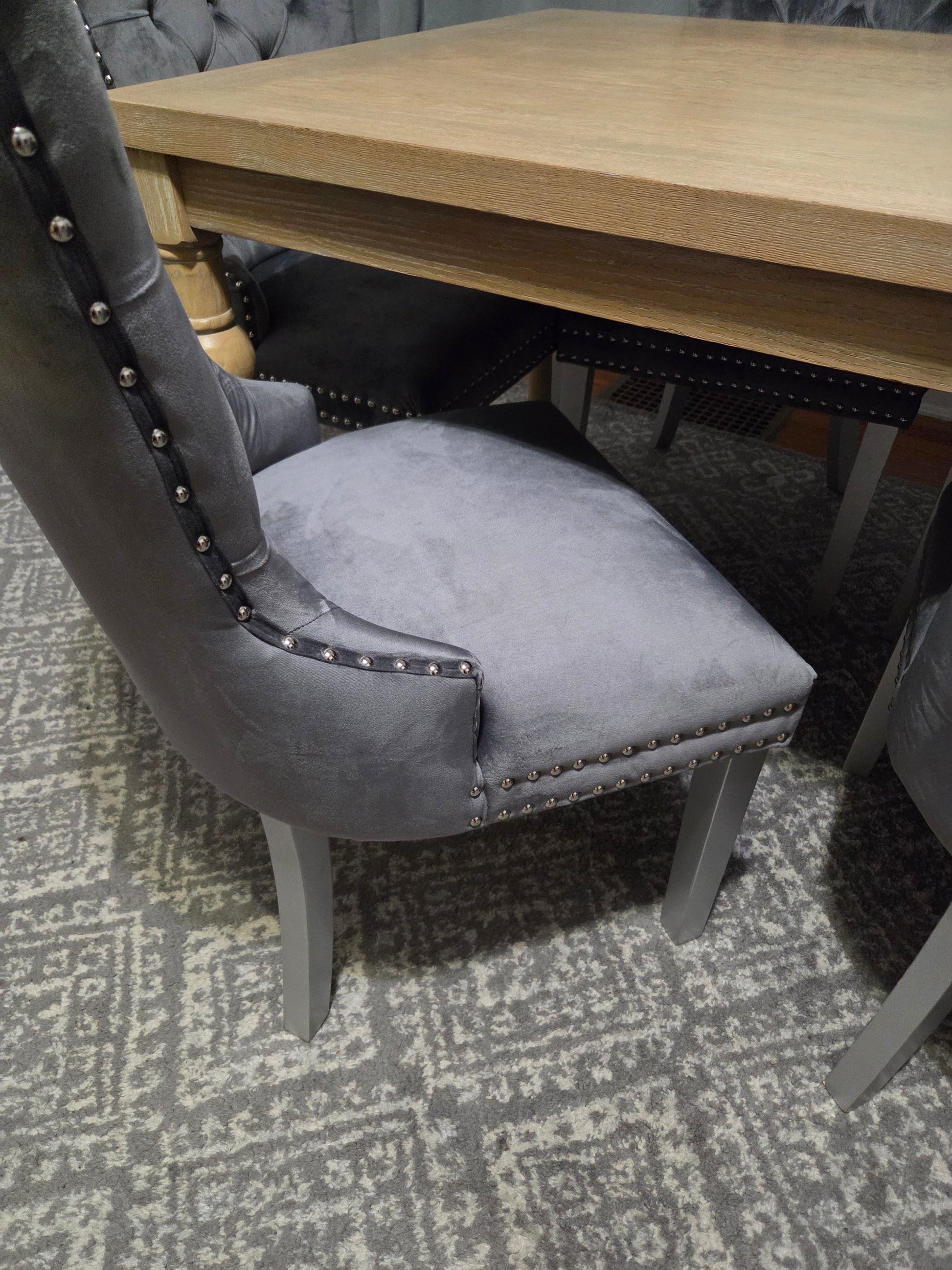 Gray tufted chair